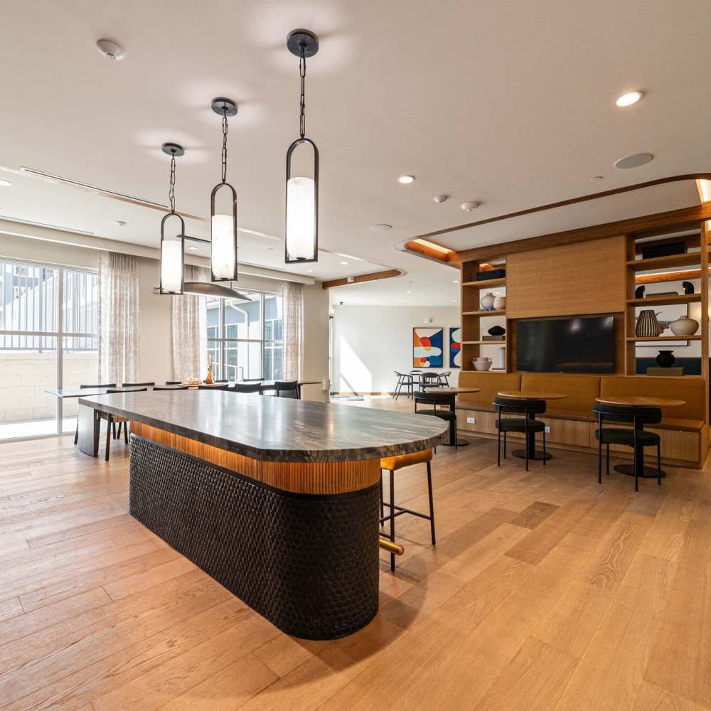 Clubhouse with a kitchen island at Main and Mill in Lewisville,Texas