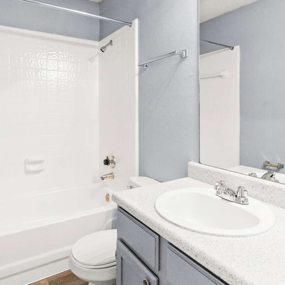 Bathroom with shower and tub at North Hills Place in Richland Hills, Texas