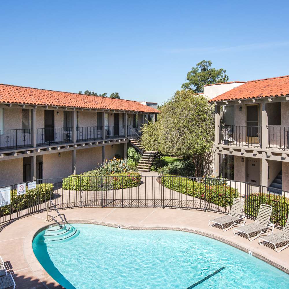 Pool with lounge chair at Casa Madrid in Cypress, California