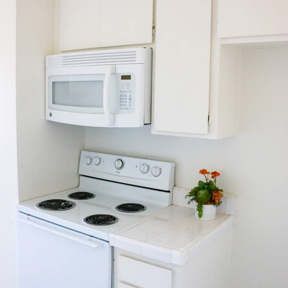 Kitchen with stove at Sandpointe in Huntington Beach, California