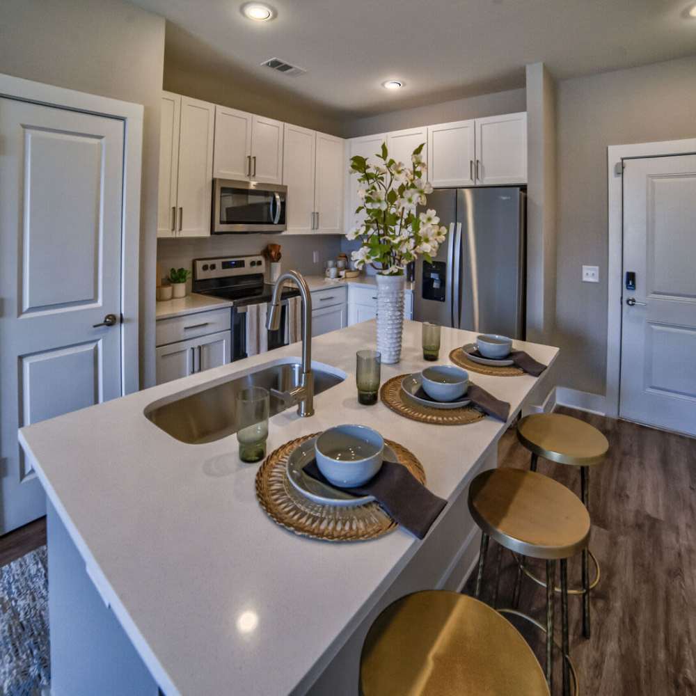 Kitchen with island at Avonlea Pointe in Duluth, Georgia