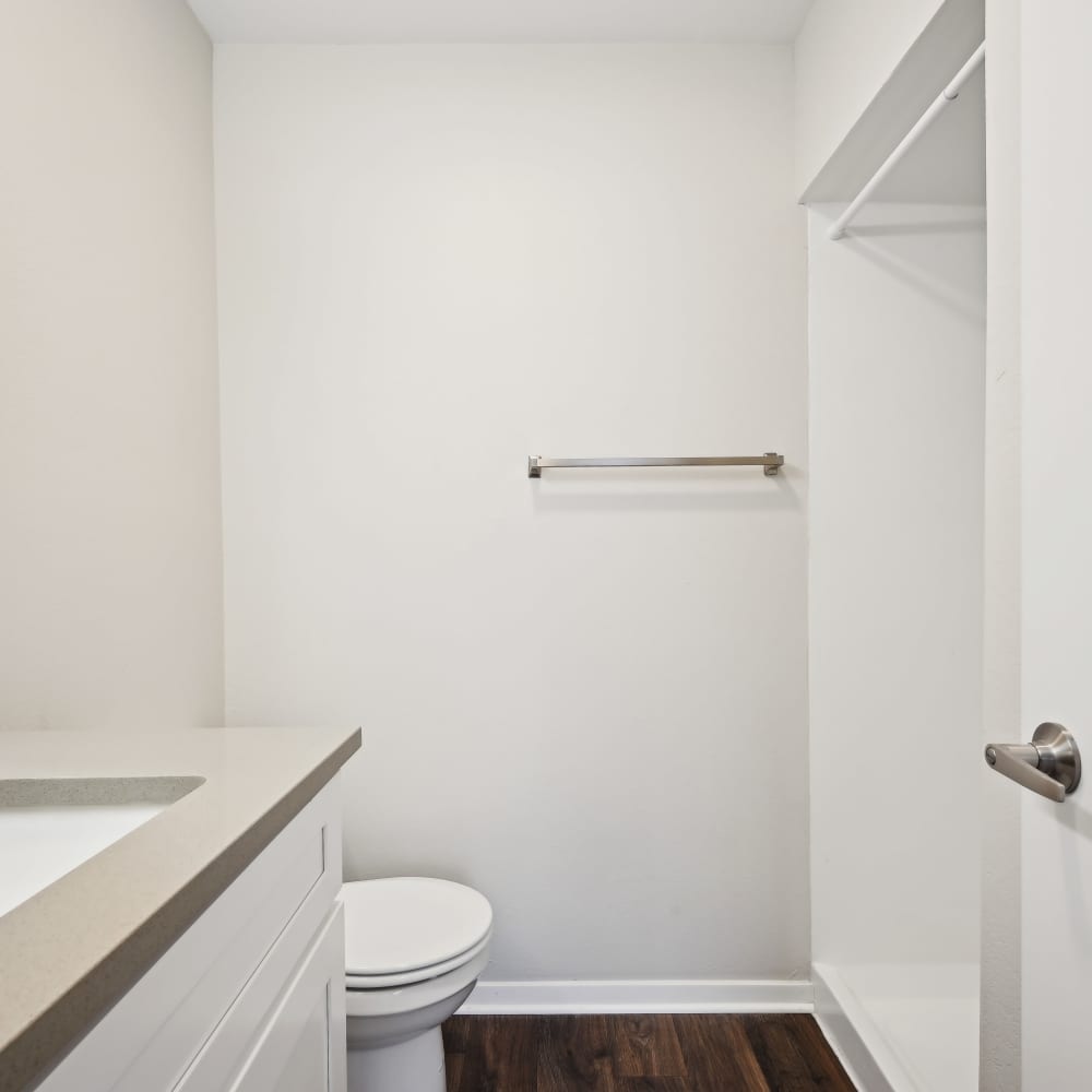 Modern bathroom with sleek fixtures and minimalistic design at Woodlands of Plano in Plano, Texas