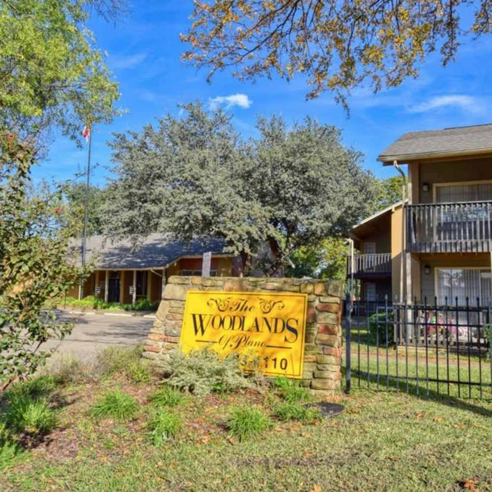 Property signage at Woodlands of Plano in Plano, Texas