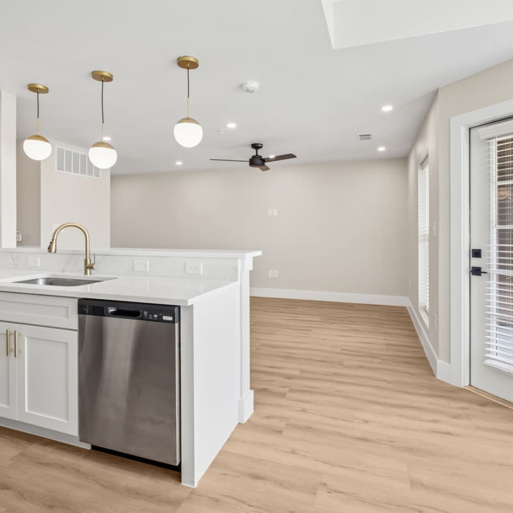 View of the living room from the kitchen at Lake Meadows in Garland, Texas