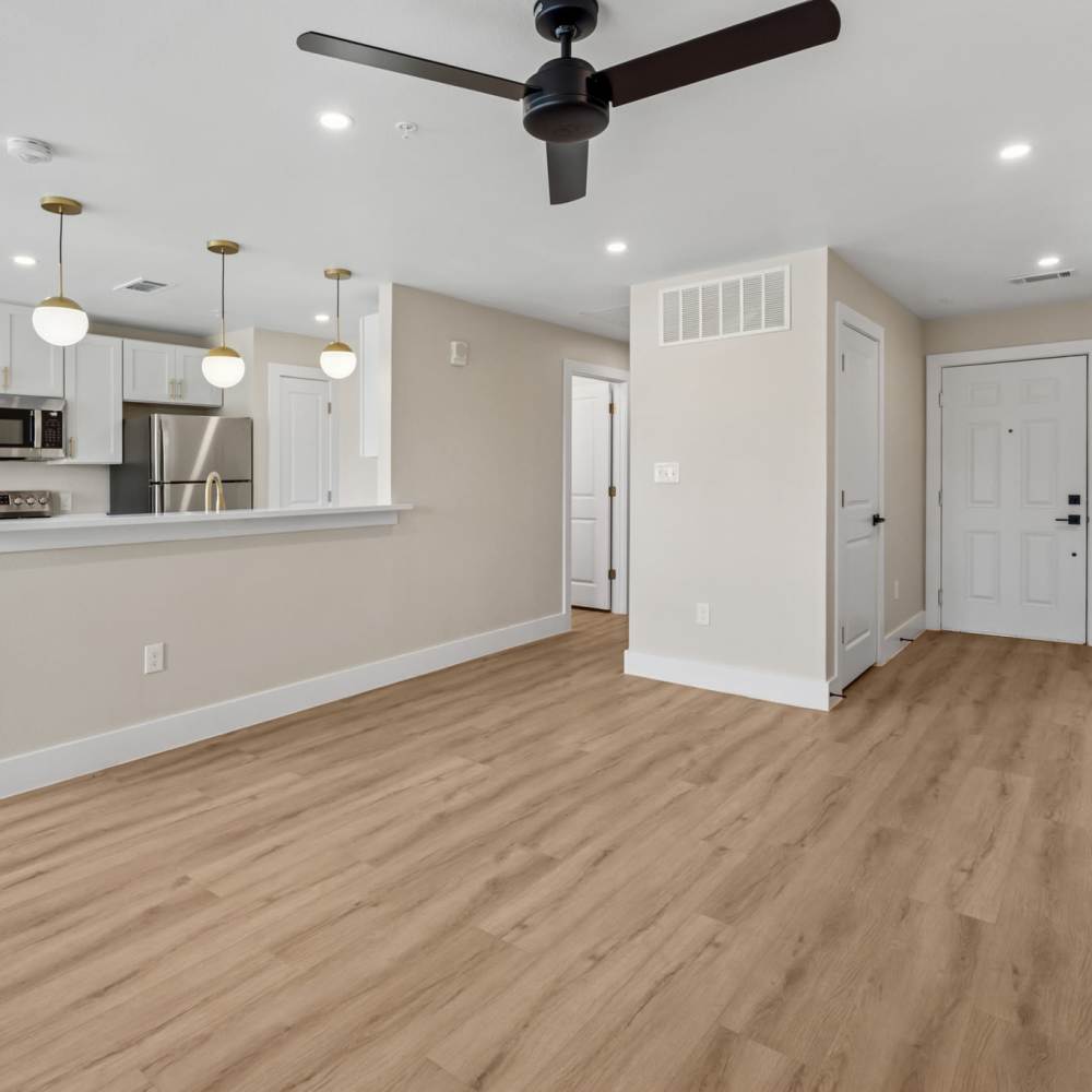 Combined view of the kitchen and the dining area at Lake Meadows in Garland, Texas