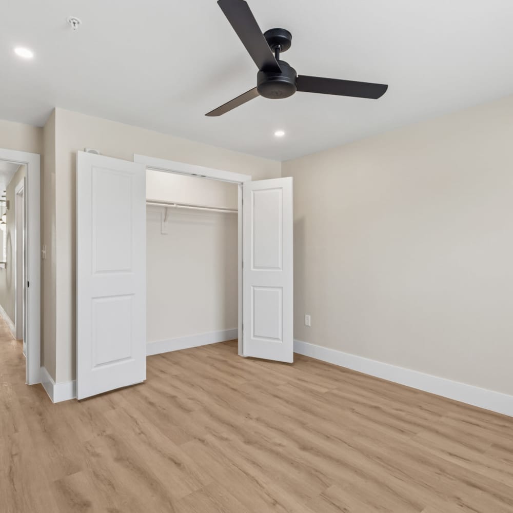 Bedroom with a closet area at Lake Meadows in Garland, Texas