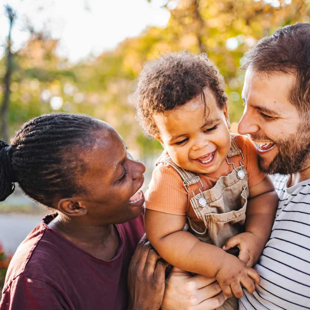 Happy resident family at Cottages at Craft Farms in Gulf Shores,Alabama