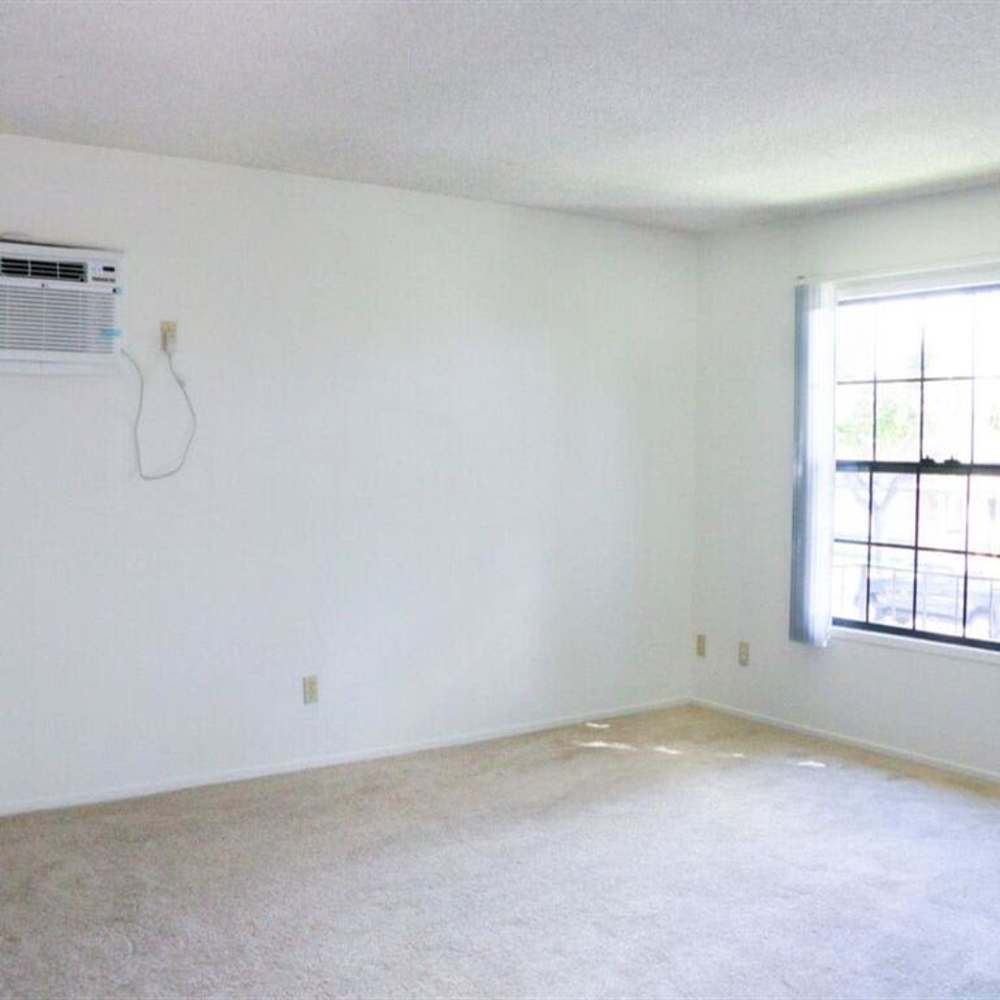 Unfurnished bedroom with window at Casa Madrid in Cypress, California