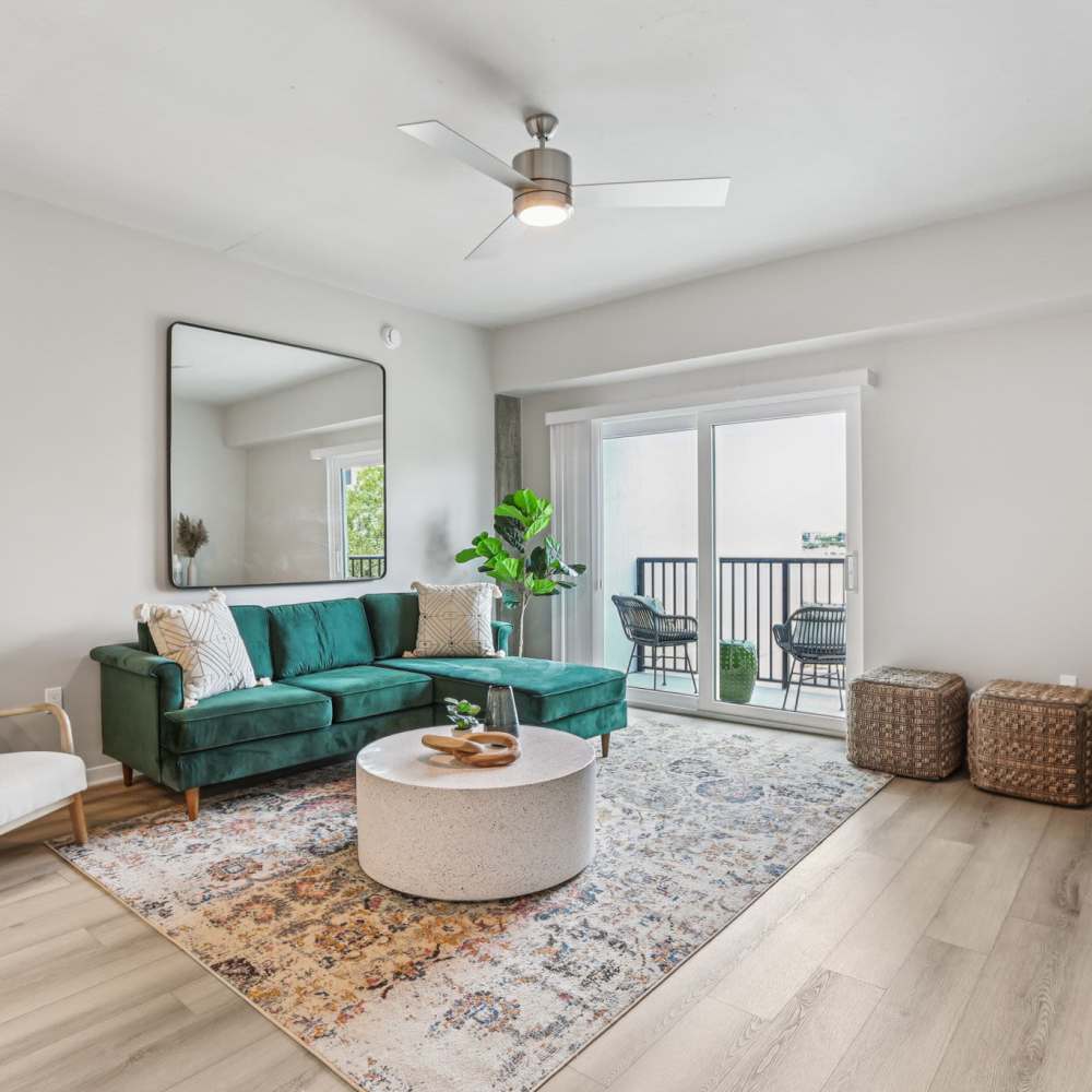 Living room with ceiling fan at The Breeze in Winter Haven, Florida