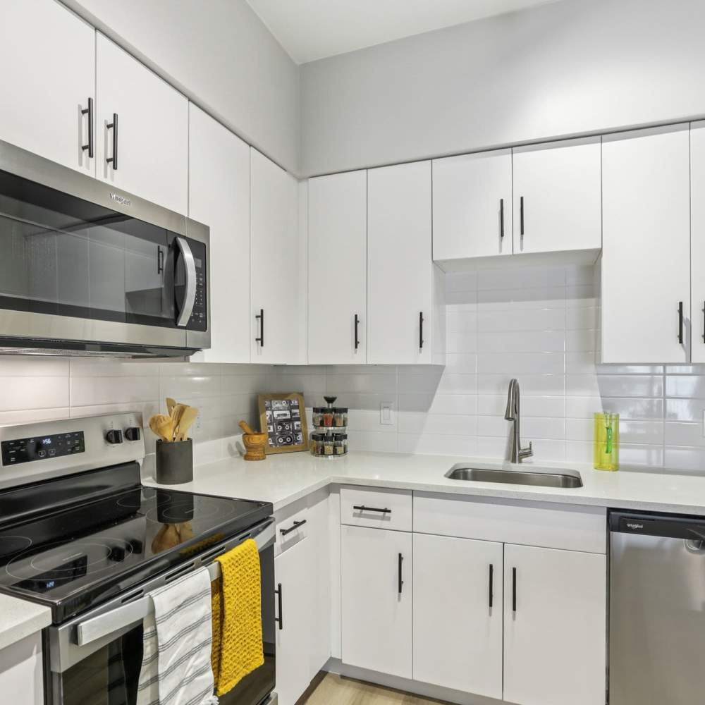 Kitchen with white cabinets at The Breeze in Winter Haven, Florida