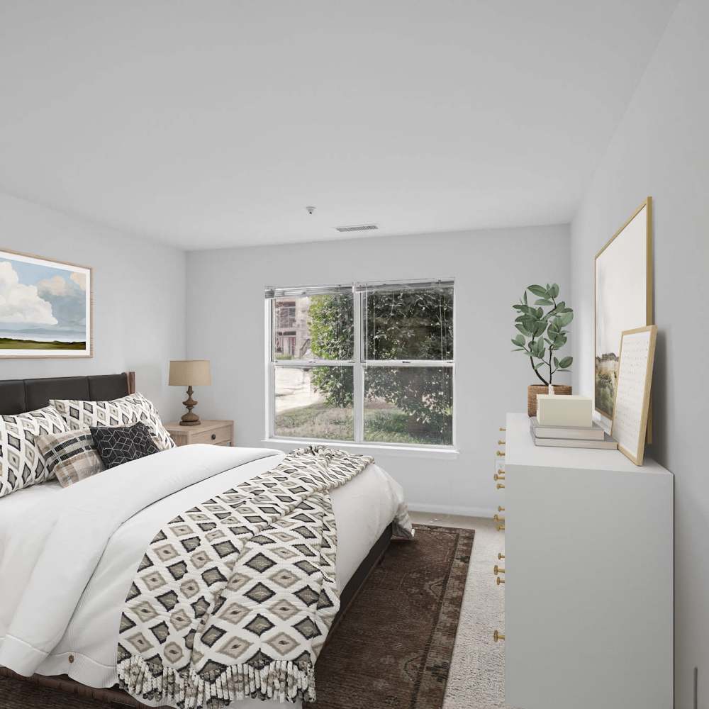 Bedroom with large windows at Eagle Rock Apartments at Columbia Pike in Arlington, Virginia