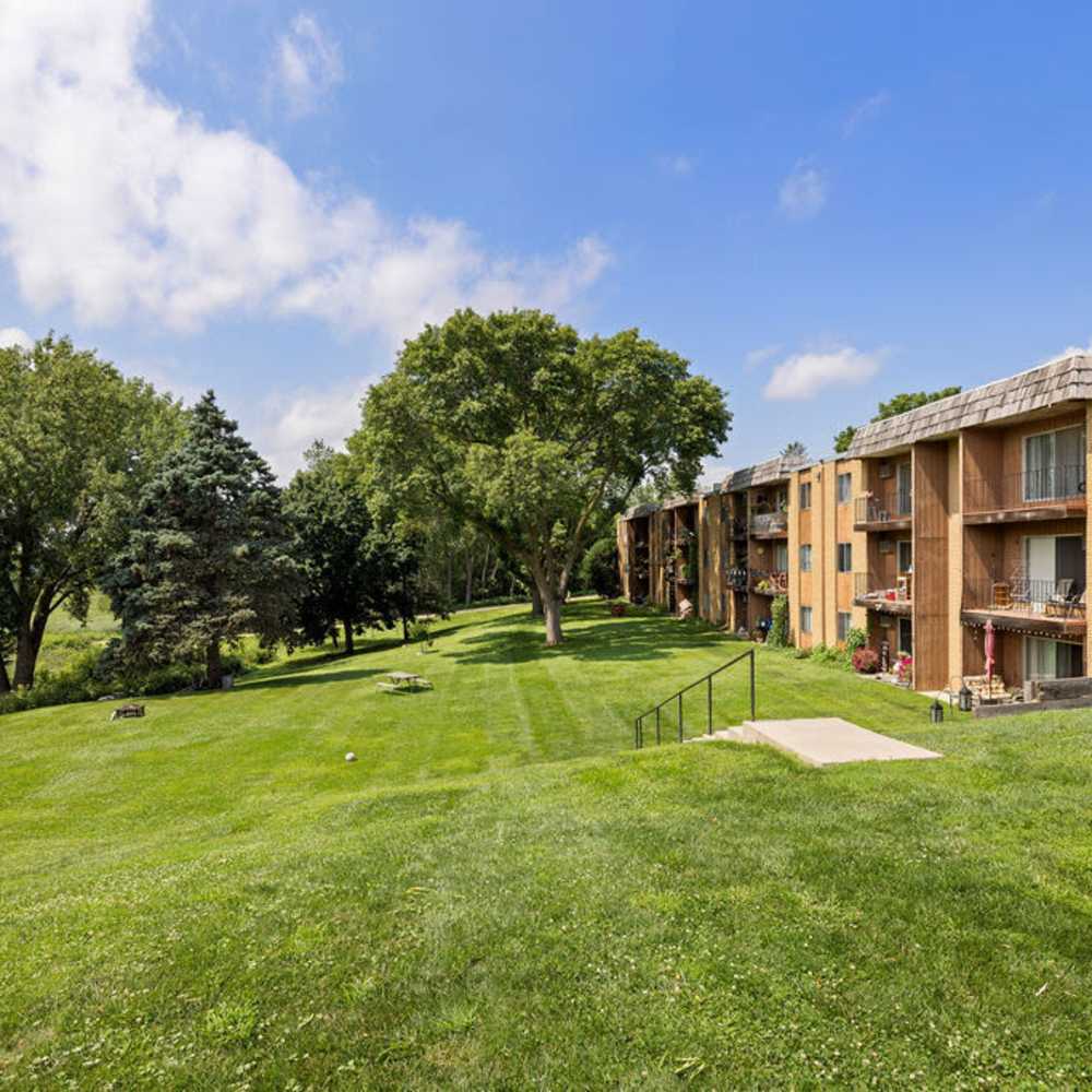 Apartment back yard lawn view at Solace on Lake Minnetonka in Spring Park, Minnesota