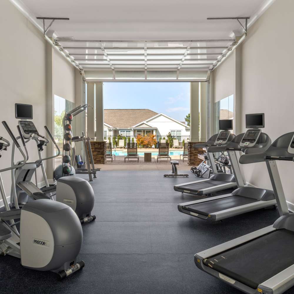 Aerial shot of the apartments with pool view at The Mills Apartment Homes in Greenville, South Carolina