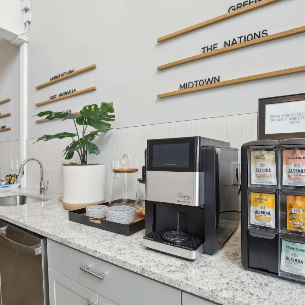 Coffee station with beverage options at 7 at Seven Mile Creek in Nashville, Tennessee