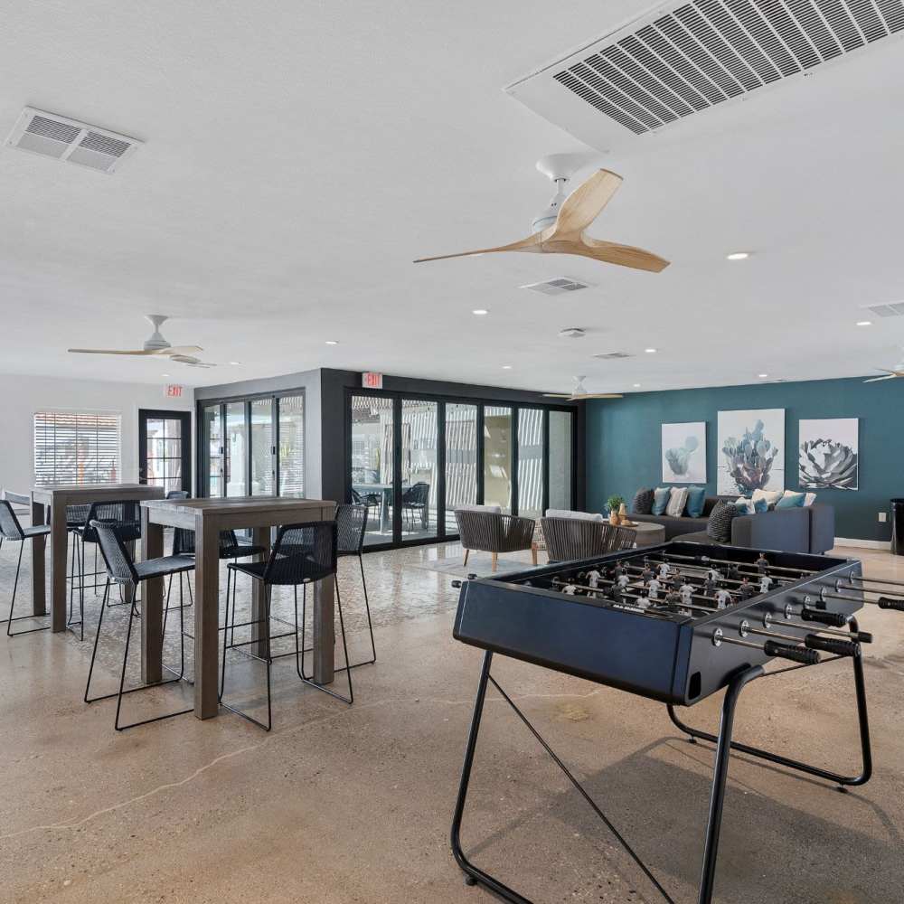 Game room with foosball tables at Fairways on Green Valley in Henderson, Nevada