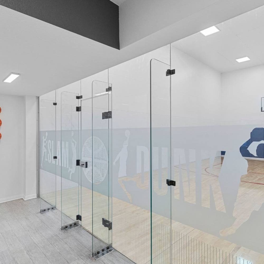 Glass‑enclosed shower and locker area at Fairways on Green Valley in Henderson, Nevada