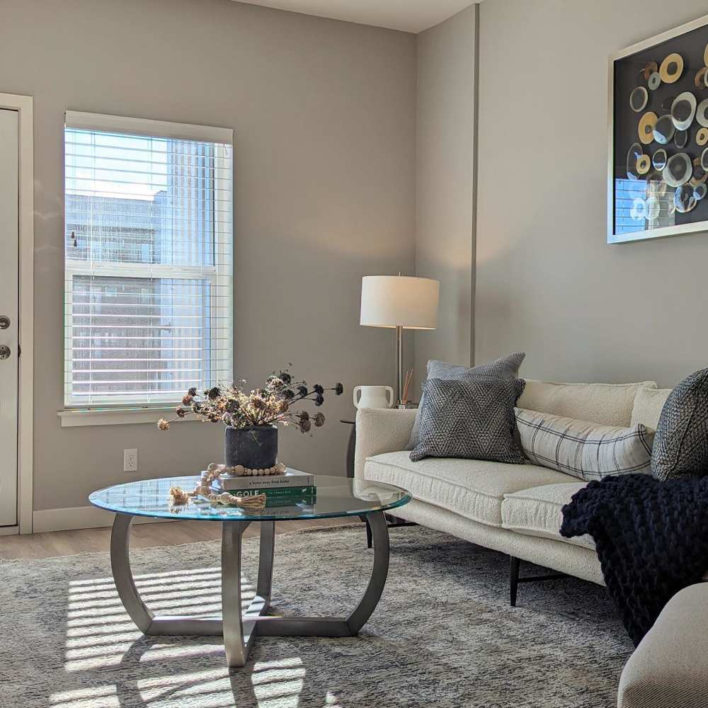 Living room with balcony at Shiloh Commons in Billings, Montana