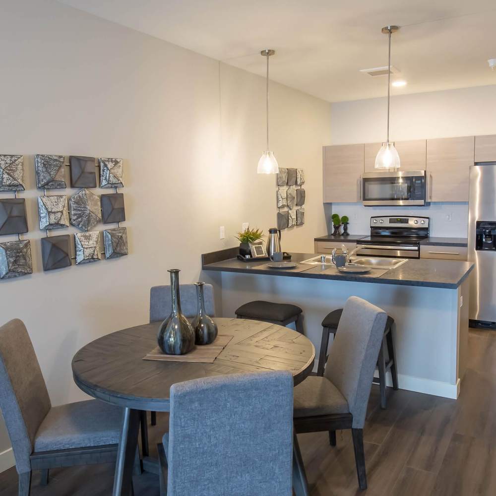Dining area near breakfast island at Shiloh Commons in Billings, Montana