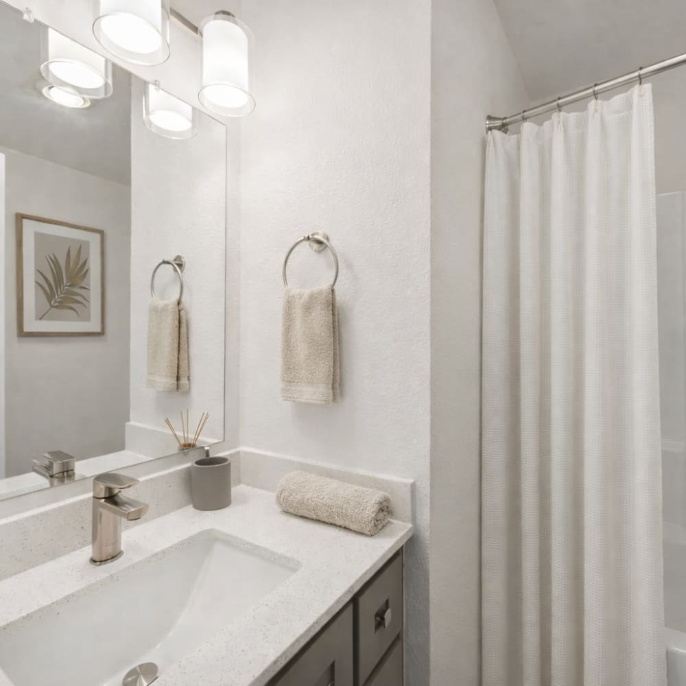 bathroom with quartz counters