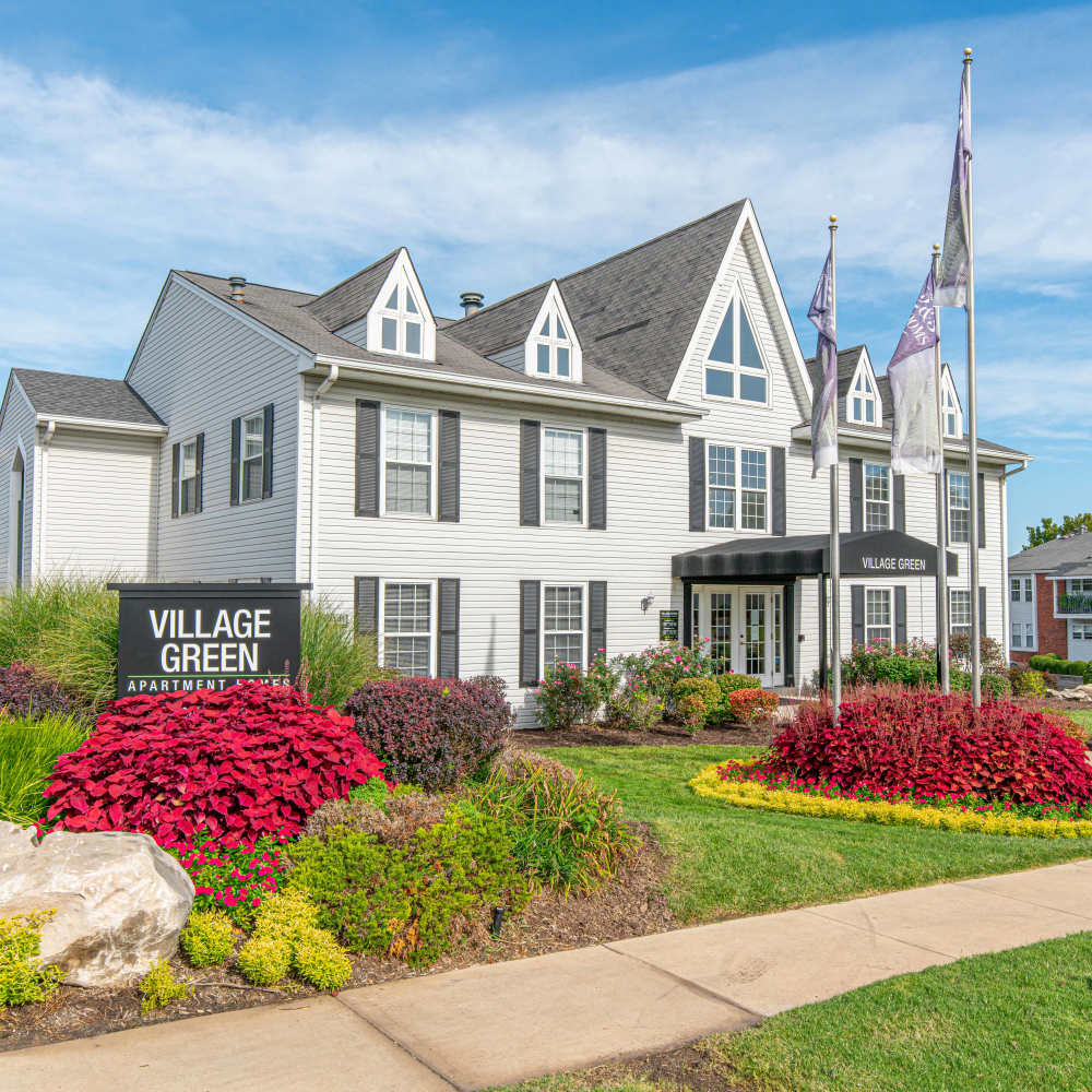 Exterior shot of an apartments entrance at Village Green Apartments in Chesterfield, Missouri