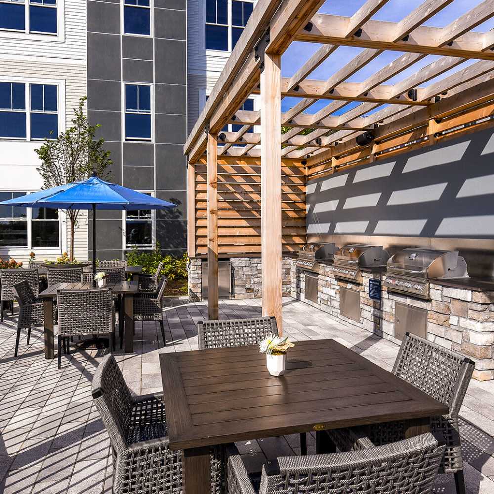 Grilling area at J Woburn Heights in Woburn, Massachusetts