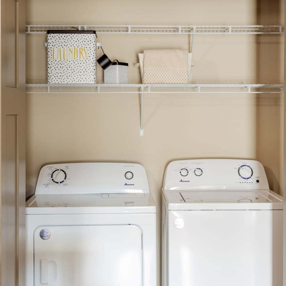 Laundry room with washer and dryer at InterUrban Apartments in Billings, Montana