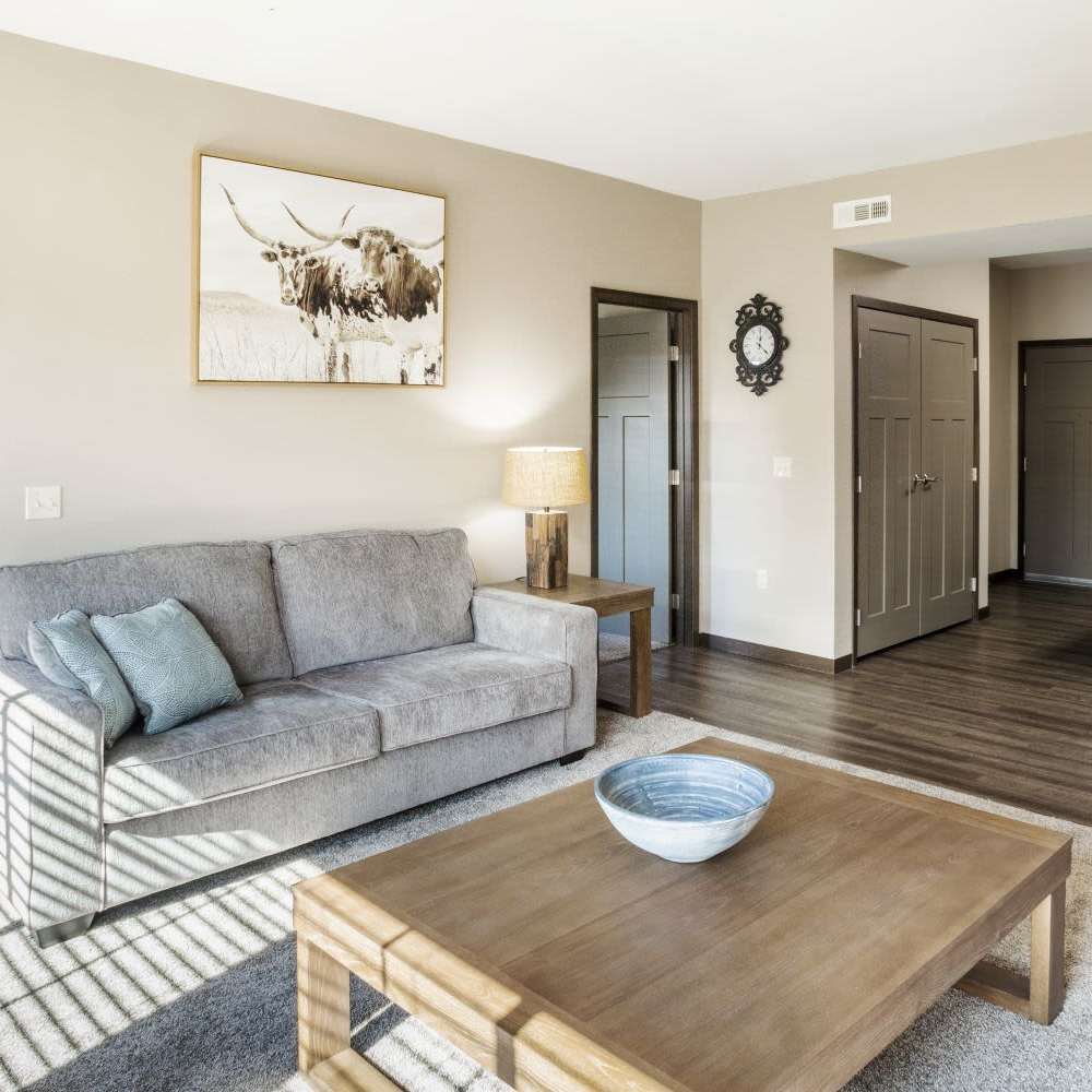 Living room with center table at InterUrban Apartments in Billings, Montana