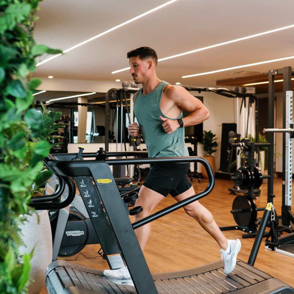 Resident running on the treadmill at Green|House Columbus in Columbus, Ohio