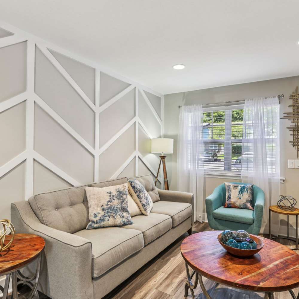 Living room with decorative walls at The Ashley in Columbia,Tennessee