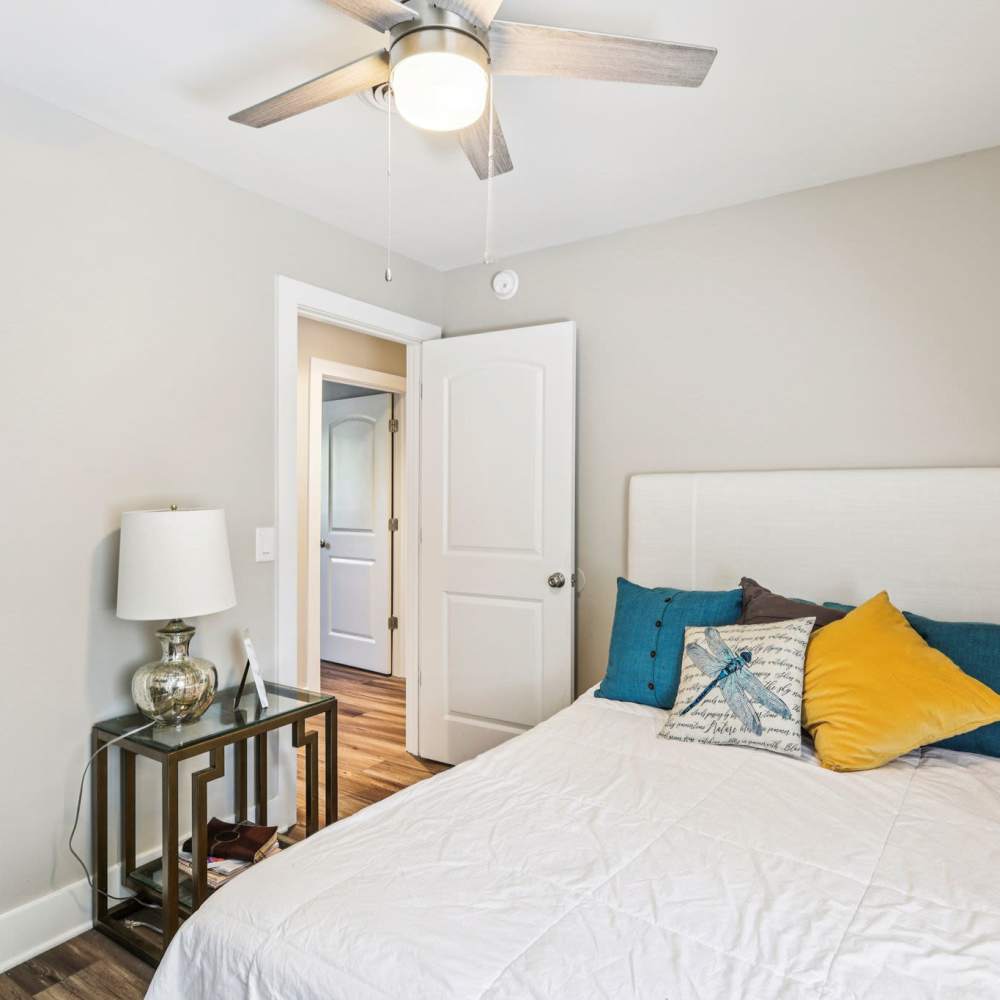 Well-lit bedroom with bedside lamp at The Ashley in Columbia,Tennessee