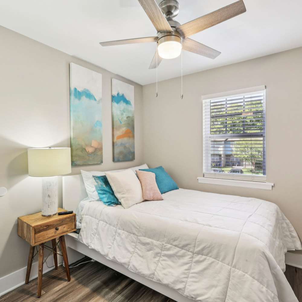 Modern-style living room with wooden bedside table at The Ashley in Columbia,Tennessee