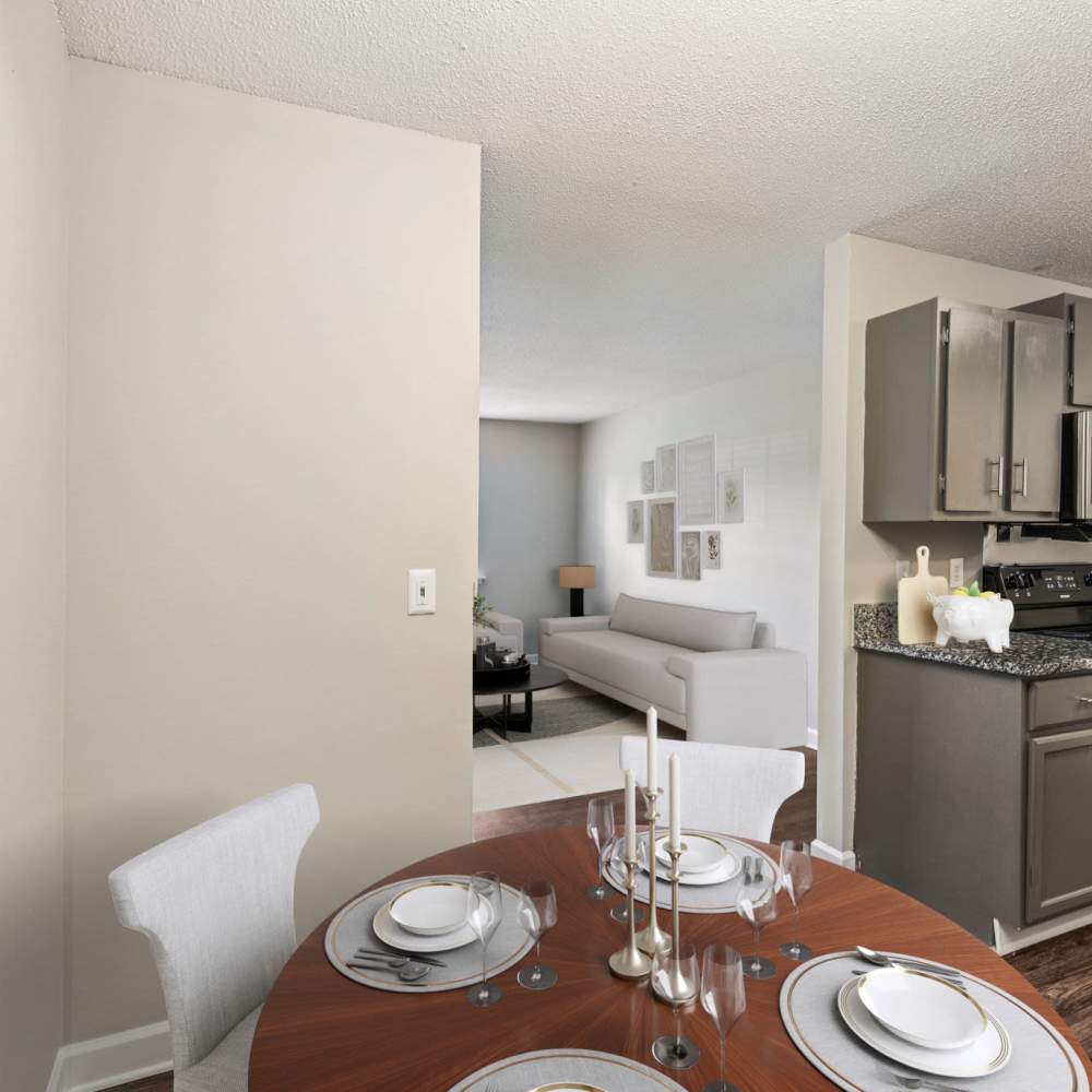 Dining area with wood-style dining table at The Ashley in Columbia,Tennessee