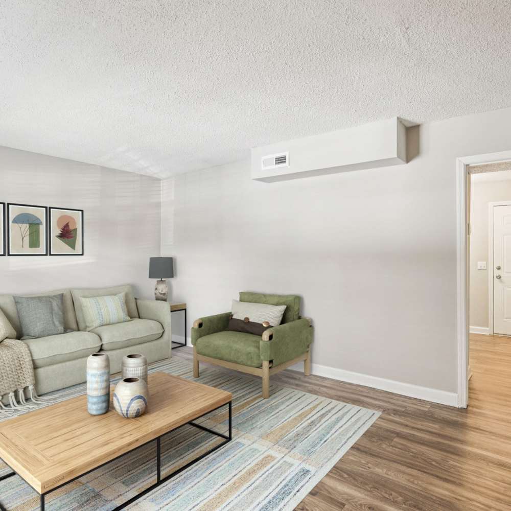 Living room with wood-style flooring at The Ashley in Columbia,Tennessee