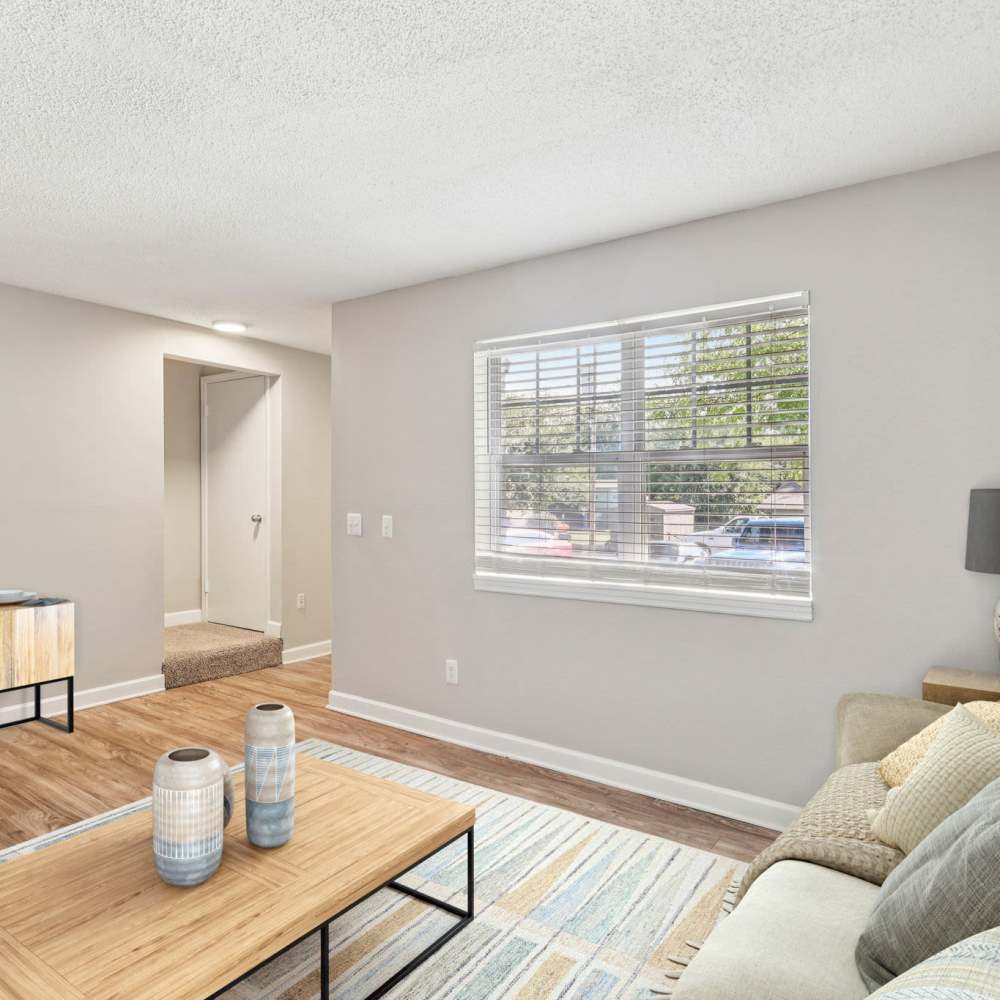 Refreshing living room with a large window  at The Ashley in Columbia,Tennessee