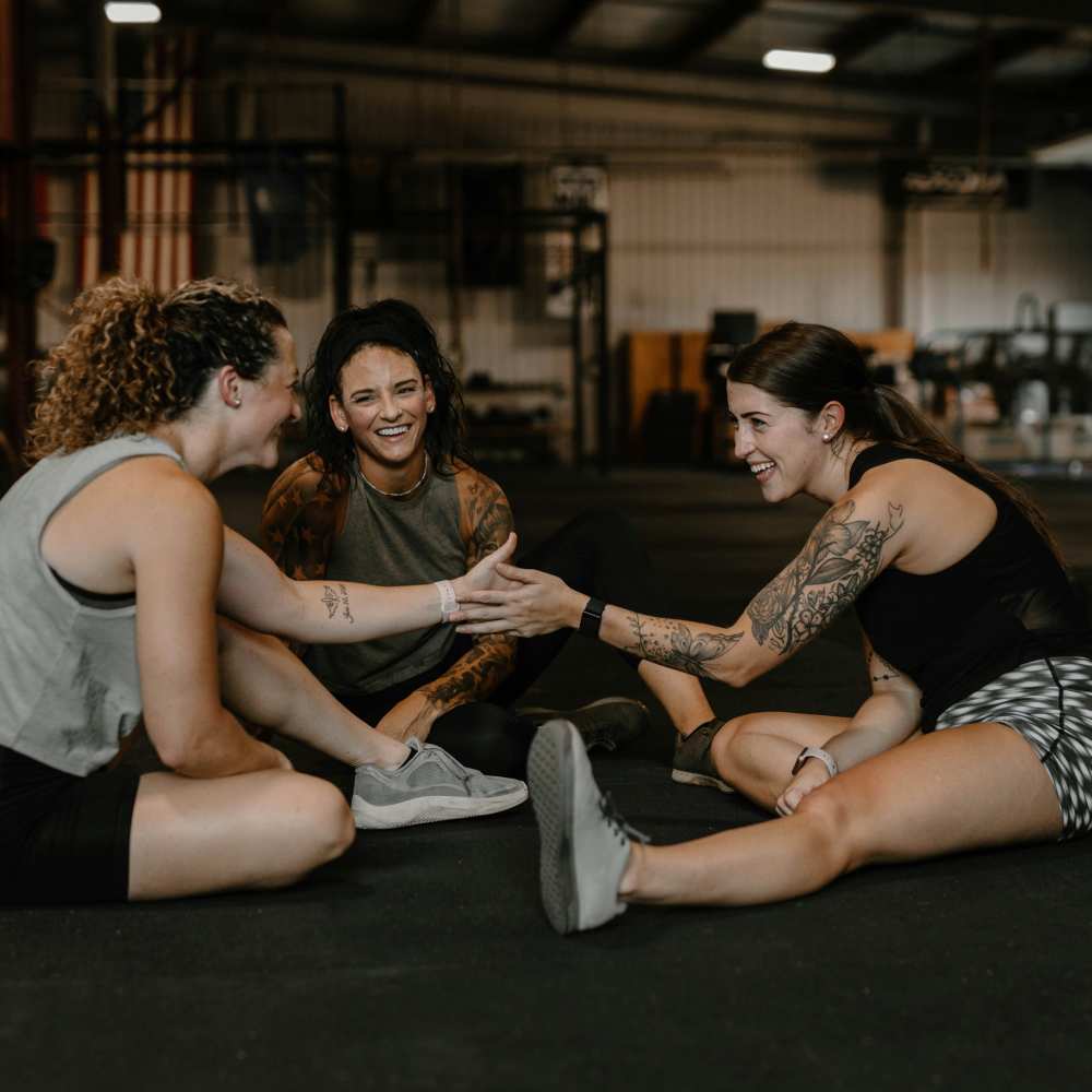 Resident with friends in gym near Haven + Arrow in Rancho Cucamonga, California