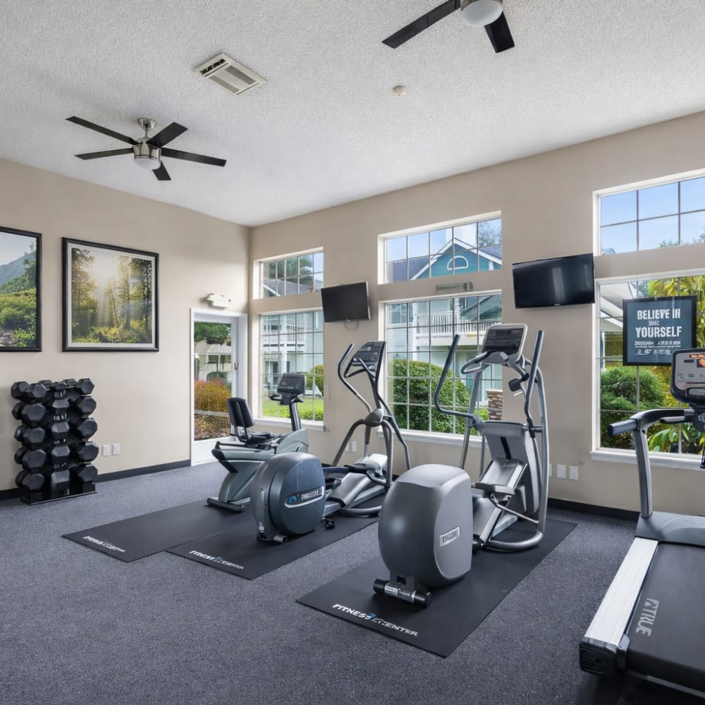 A vibrant community fitness center featuring diverse exercise equipment at Terravista in Tacoma, Washington