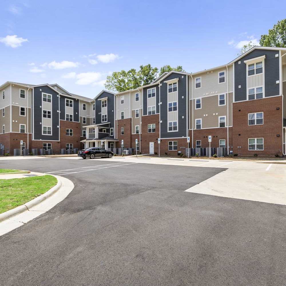 Modern apartment building exterior at Bluebird Commons in Statesville, North Carolina