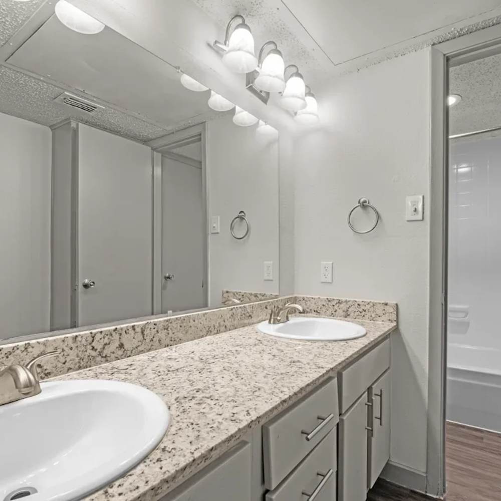 Bathroom with vanity unit at The Vance Apartments in Dallas,Texas
