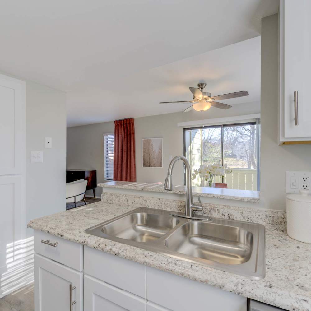 View of the living room from the kitchen at Lago Vista Apartments in St. Charles,Missouri
