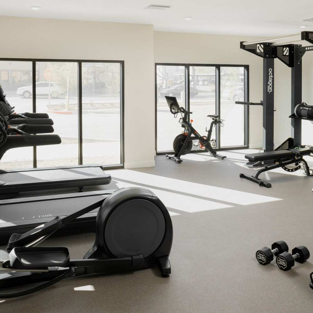 Fitness center with cardio equipment and strength training machines at Waterwalk Tucson in Tucson, Arizona