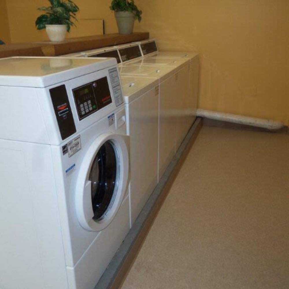 Laundry facilities at Los Flamboyanes in Rochester, New York