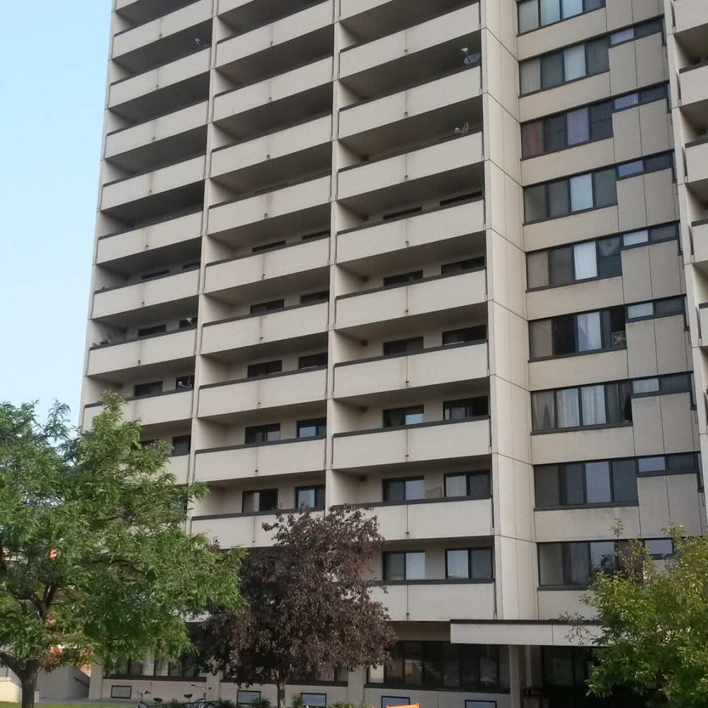 Apartment building exterior at Los Flamboyanes in Rochester, New York