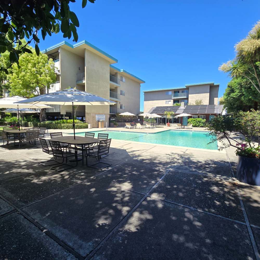 exterior multi story with pool area at Fayette Arms Apartments in Mountain View, California.