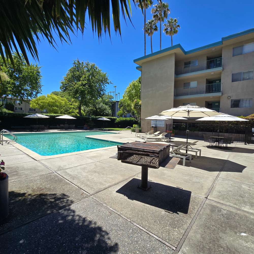 exterior multi story with pool at Fayette Arms Apartments in Mountain View, California.