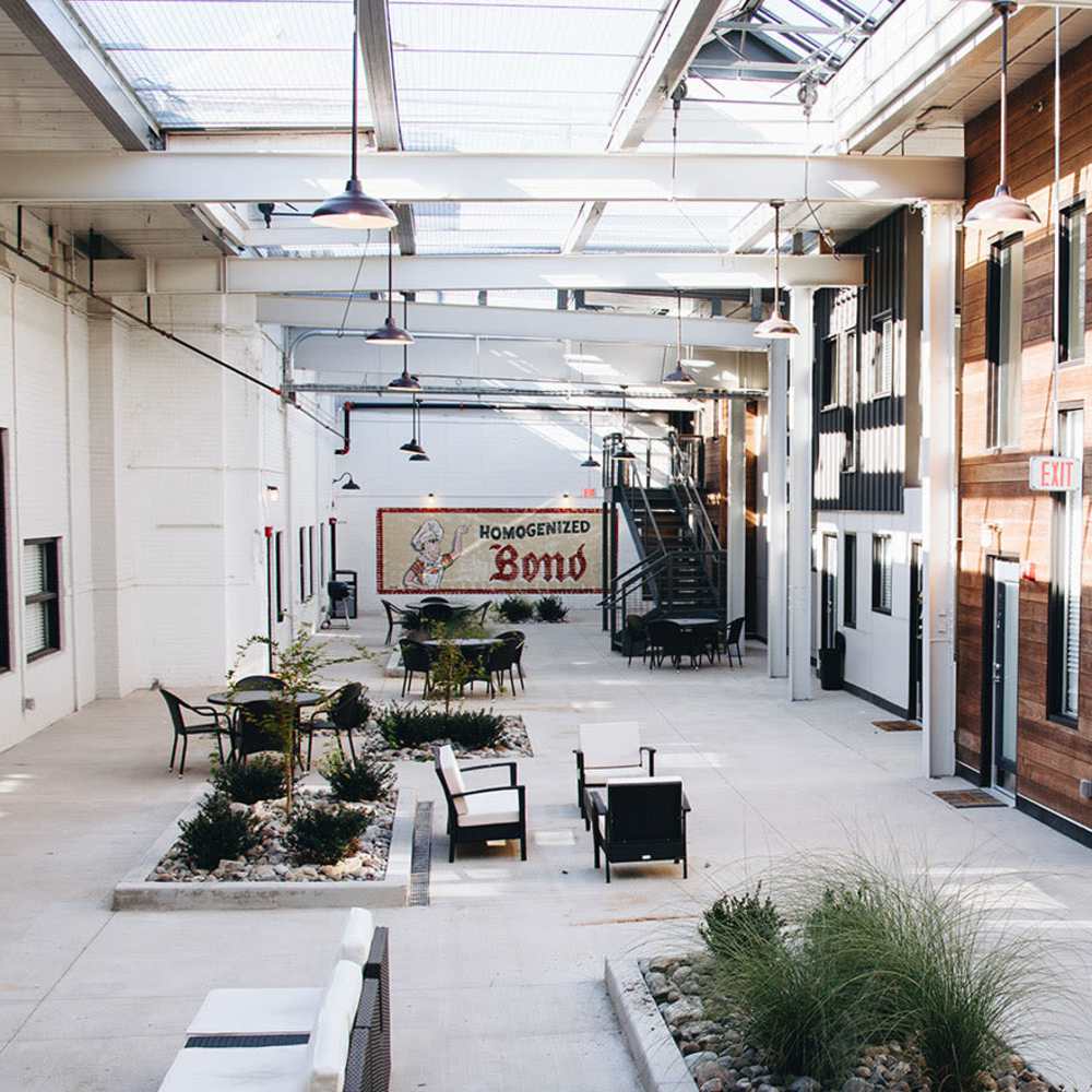 Property courtyard with grass bed at Courtyard Lofts at Scott’s Addition in Richmond, Virginia 