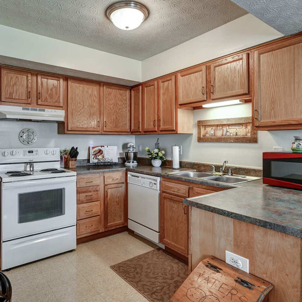 Granite countertops and wood-style cabinetry at Chartwell Greene in Mount Gilead, Ohio