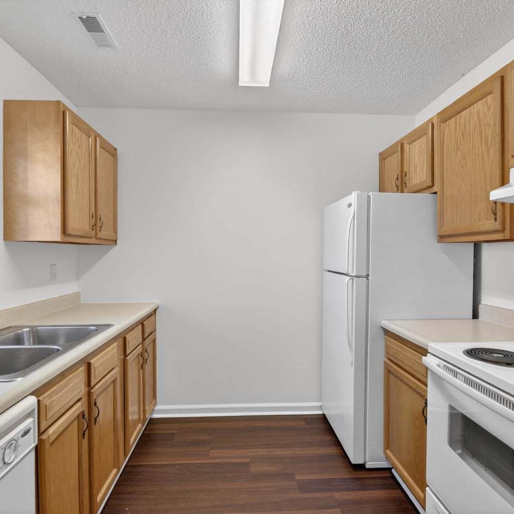 Bright kitchen with wood-style cabinets at Lake Towne Senior in Walbridge, Ohio