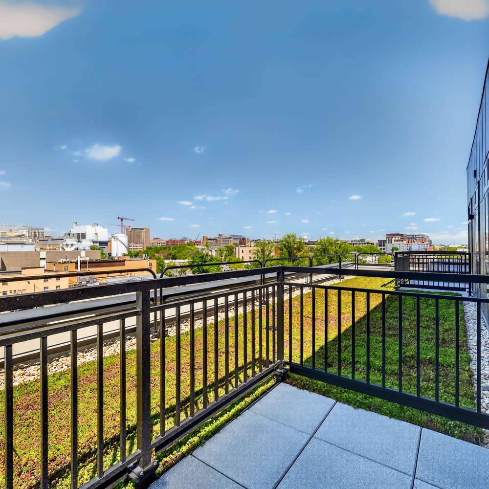 A top floor unit's patio Vicino in Madison, Wisconsin