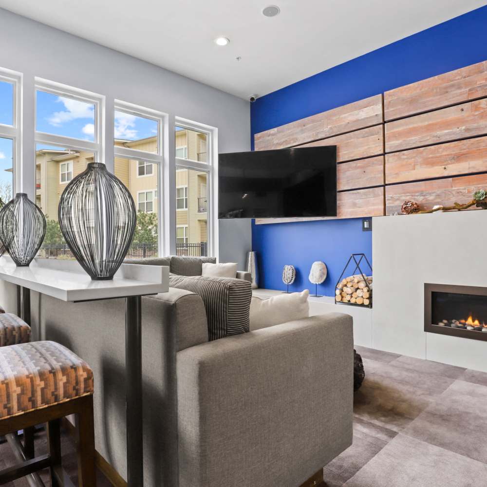Clubhouse with fireplace at Westlink at Oak Station Apartments in Lakewood, Colorado