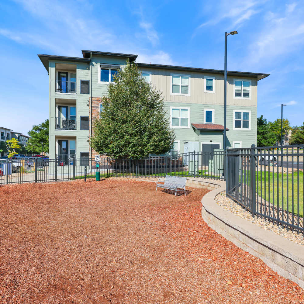 Community outside with bench for seating at Westlink at Oak Station Apartments in Lakewood, Colorado
